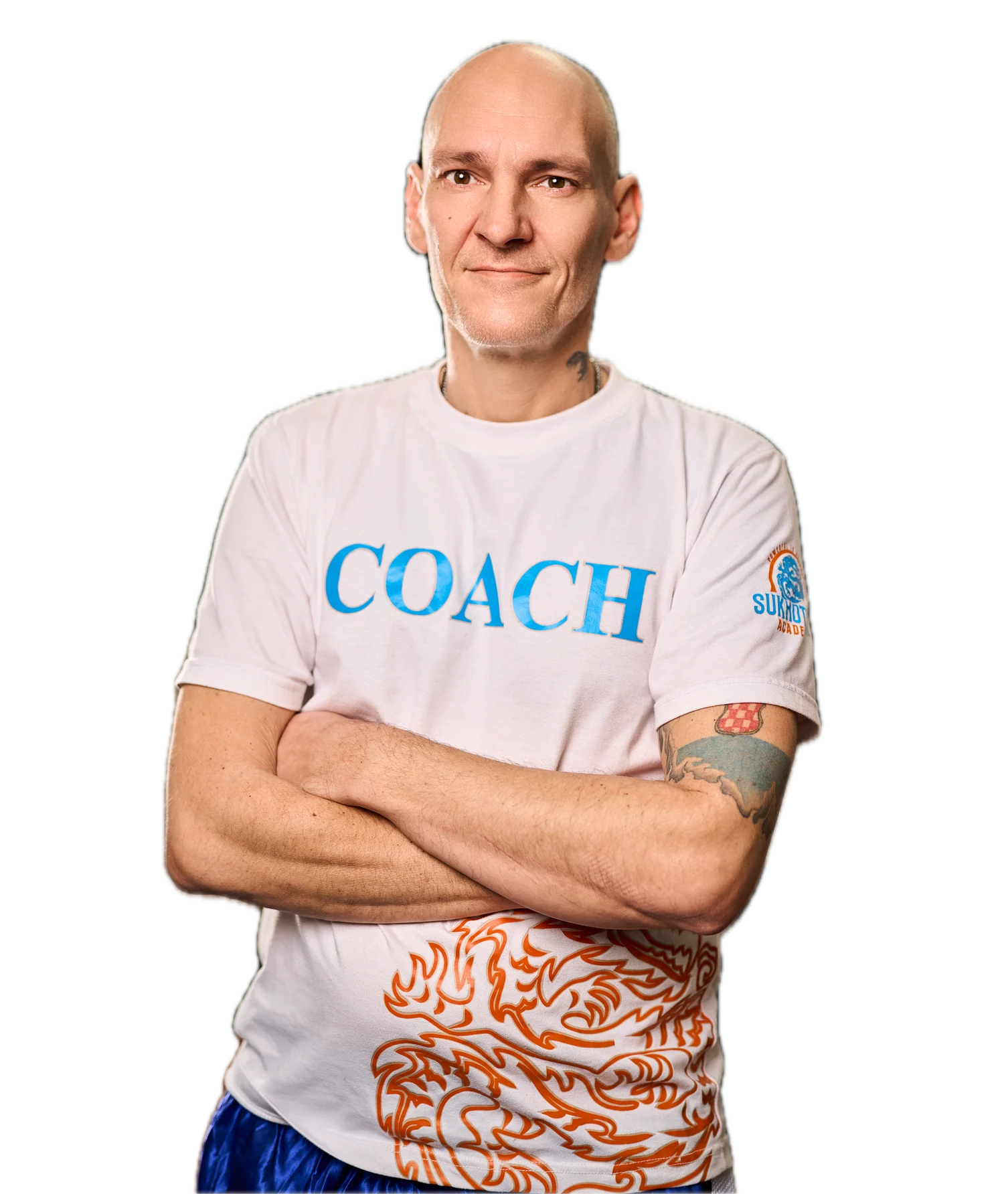 Trainer der Sukhothai Academy im COACH-Shirt